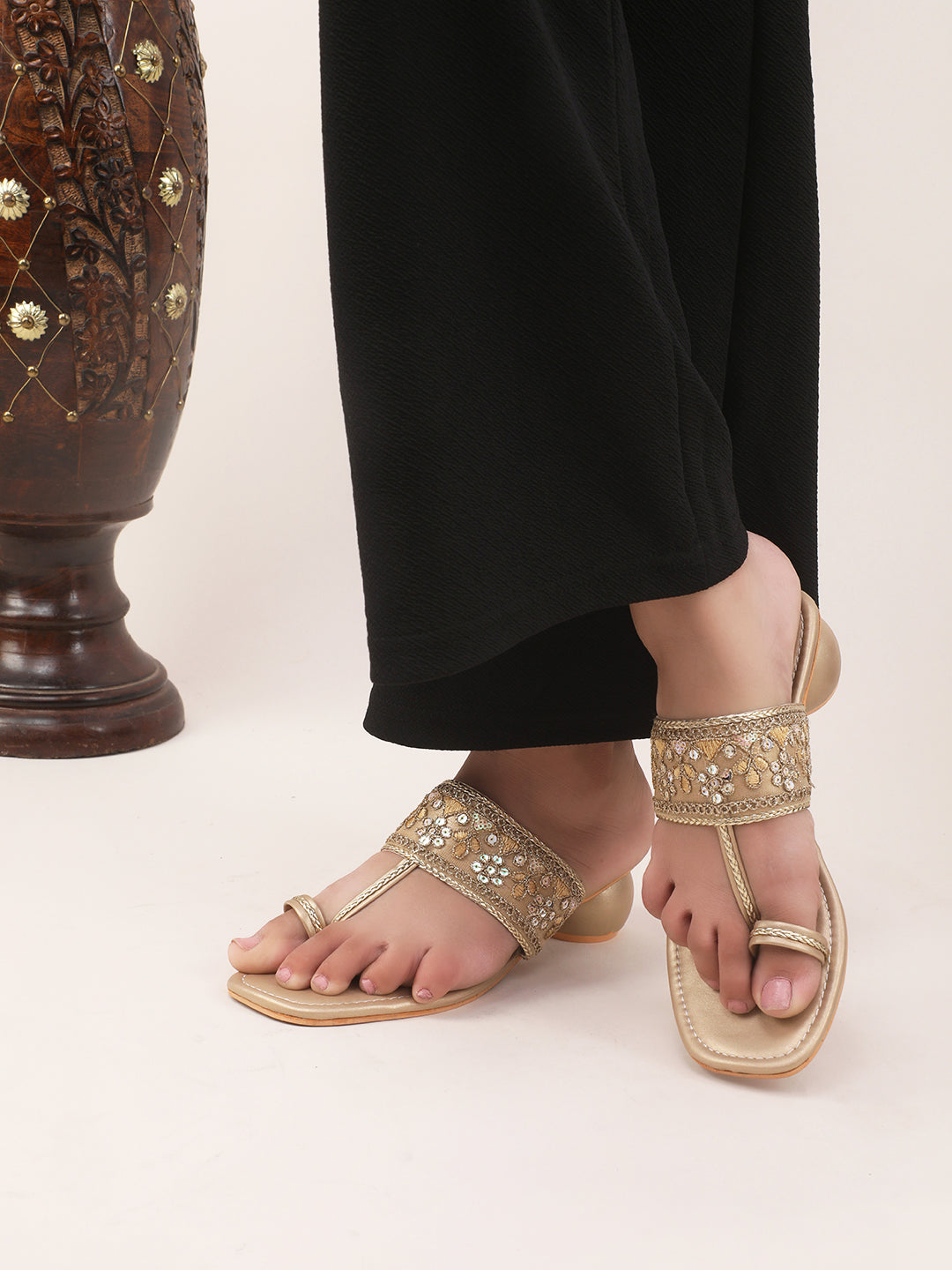 embellished toe-ring sandals with a low block heel
 Golden