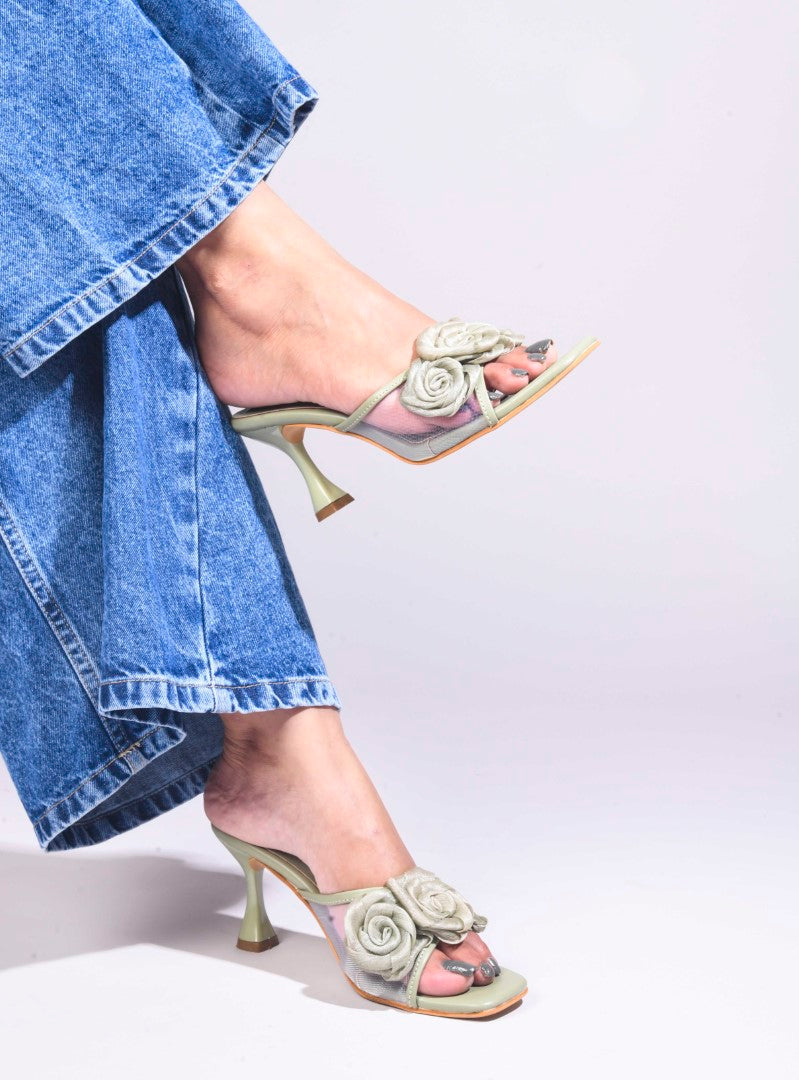 JM Looks heeled mules featuring two prominent floral appliques on the vamp strap and a flared heel
Wine