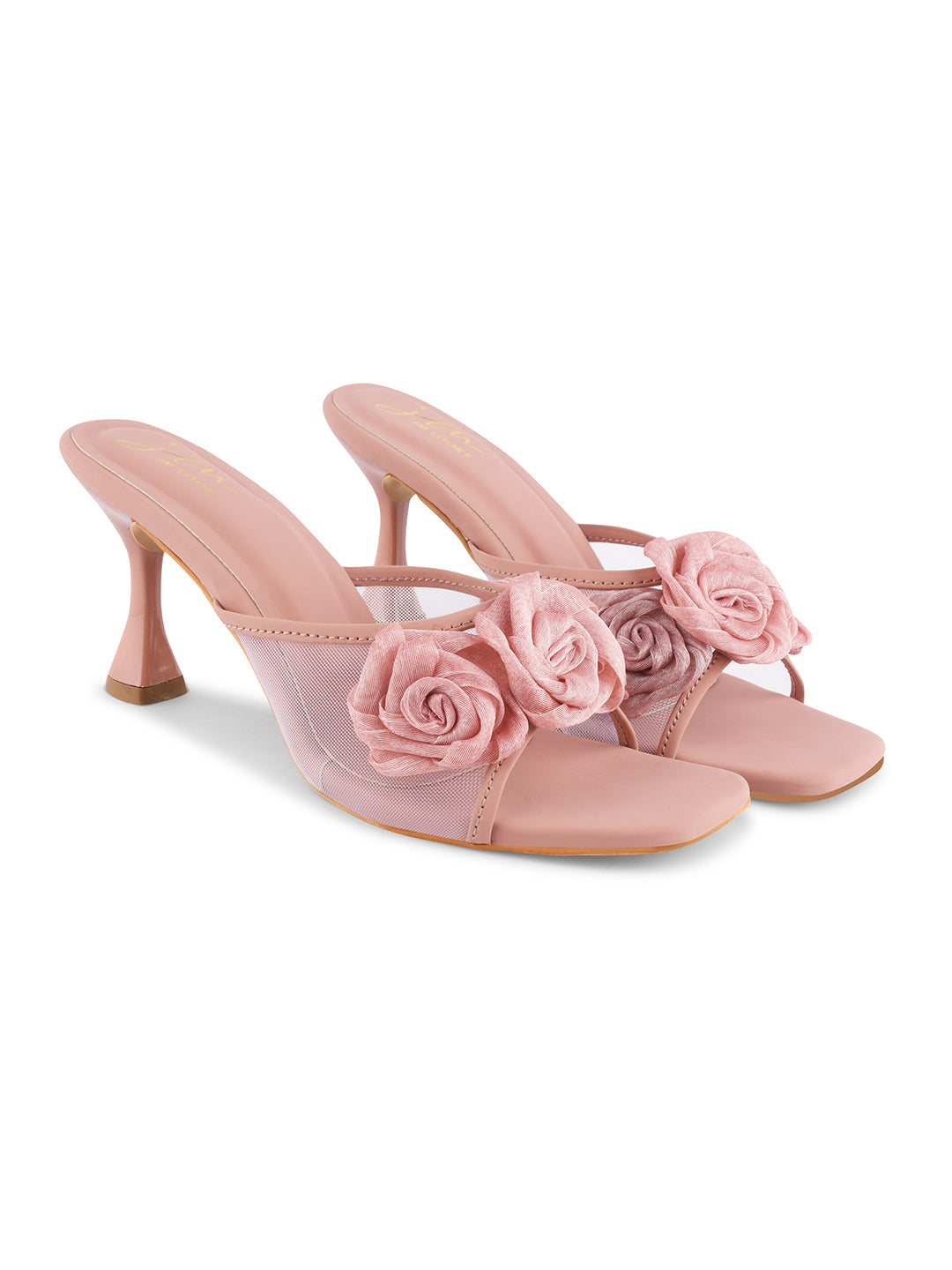 JM Looks heeled mules featuring two prominent floral appliques on the vamp strap and a flared heel
Peach
