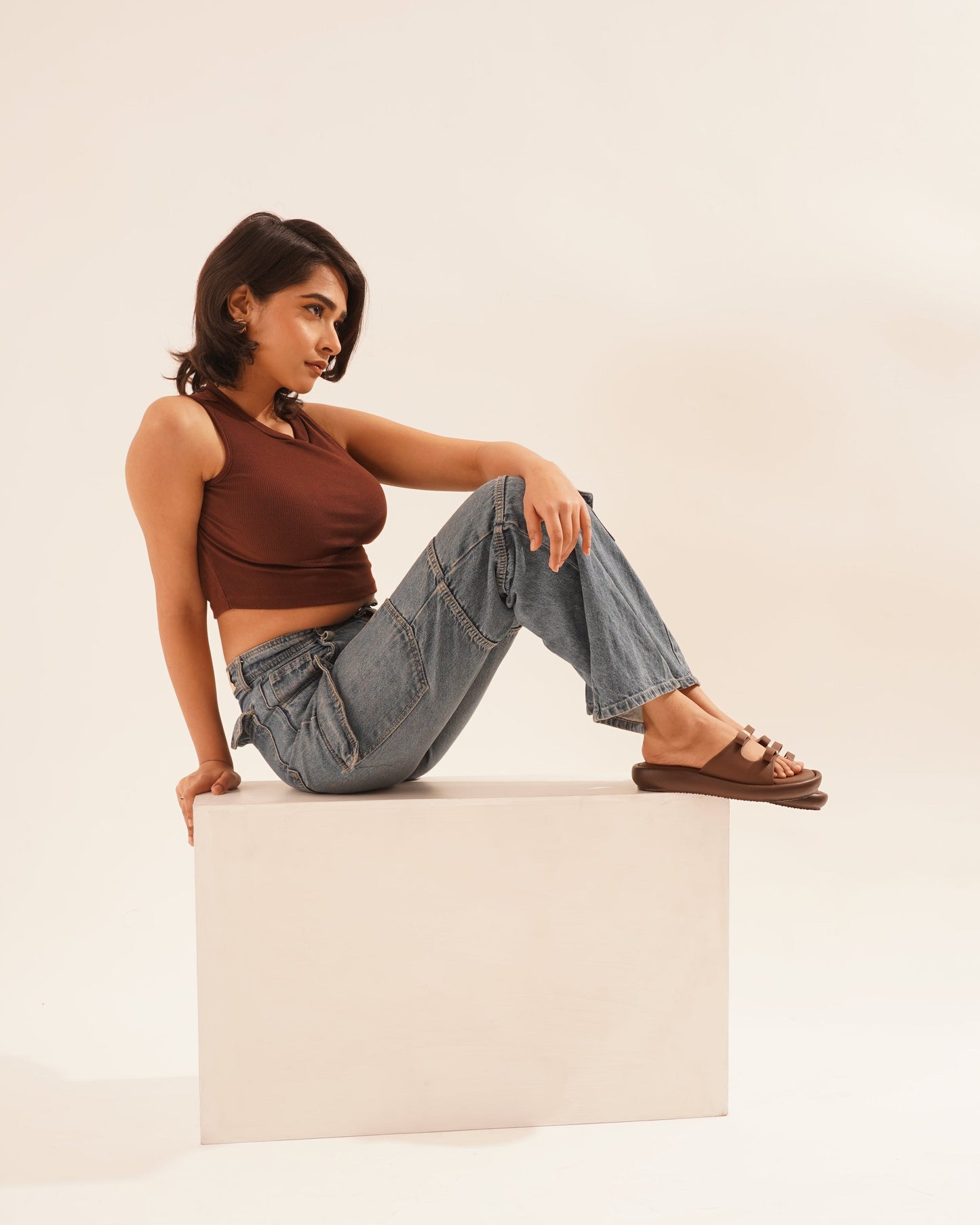 JM Looks slide sandals featuring multiple bow details on the wide straps and a flat sole
Brown