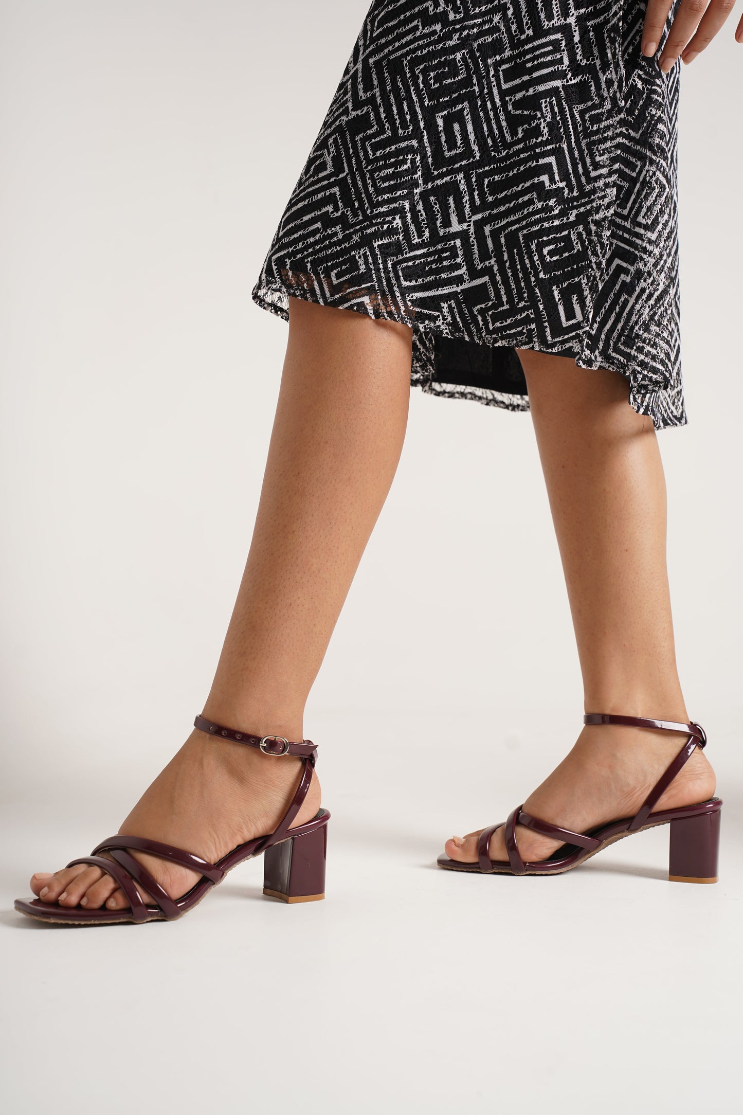 Jm Looks strappy block heel sandals with a patterned dress
Cherry