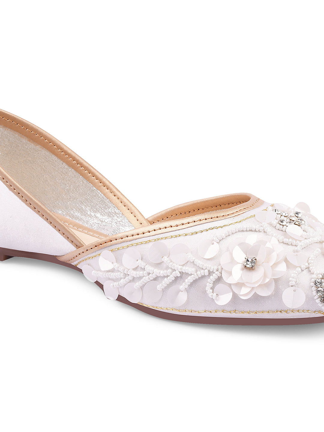 exquisitely embellished juttis with floral and beadwork detailing
White