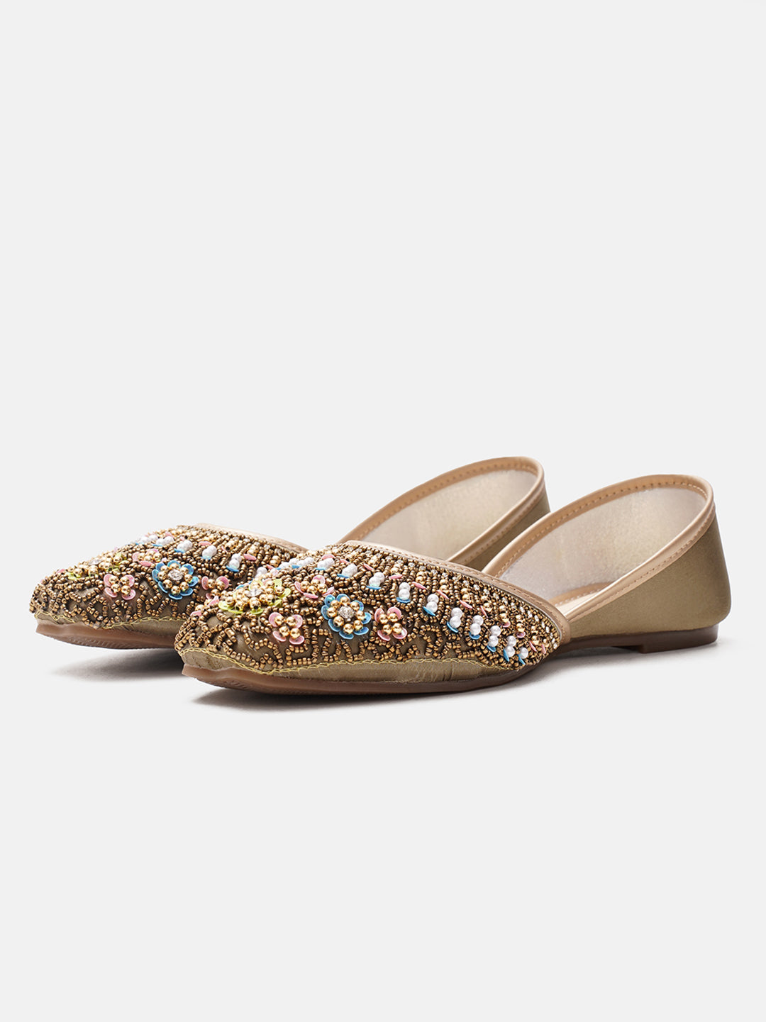 traditional juttis with intricate floral embroidery and detailed beadwork on the upper
Green