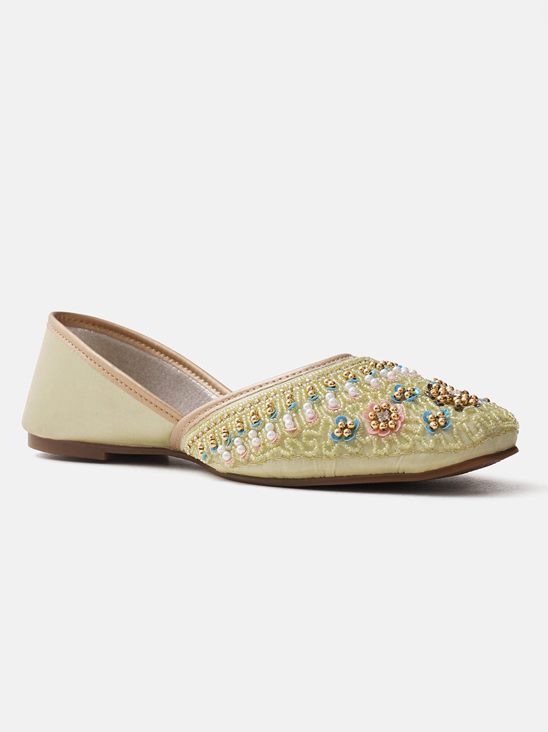 traditional juttis with intricate floral embroidery and detailed beadwork on the upper
Pista