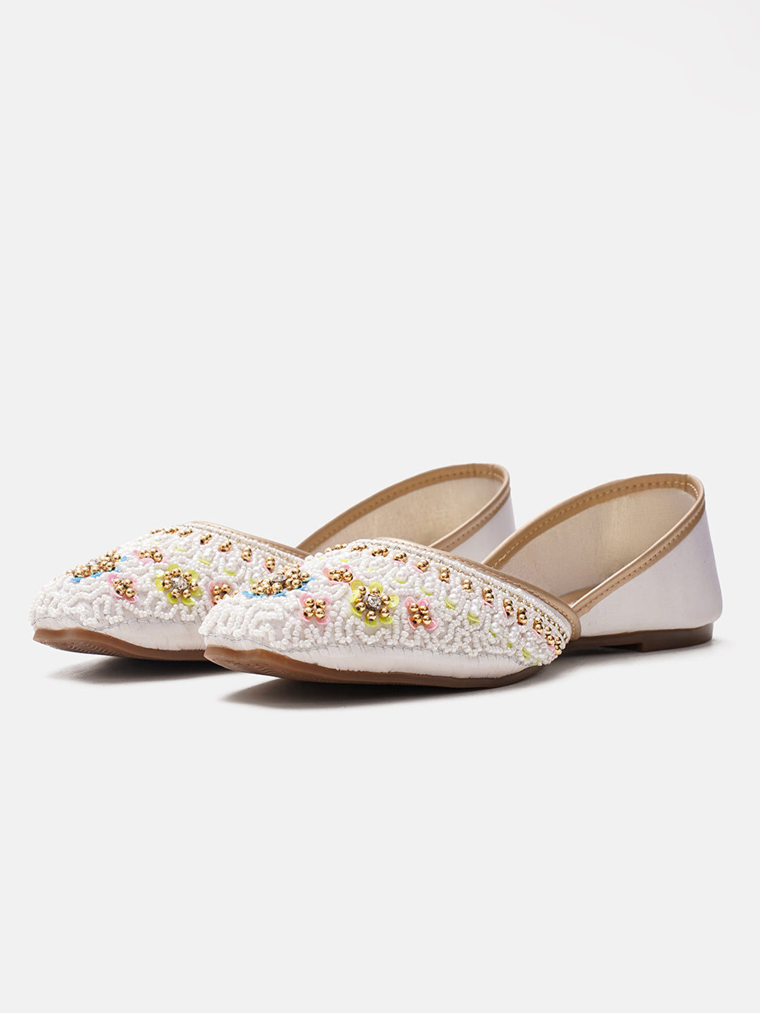 traditional juttis with intricate floral embroidery and detailed beadwork on the upper
White