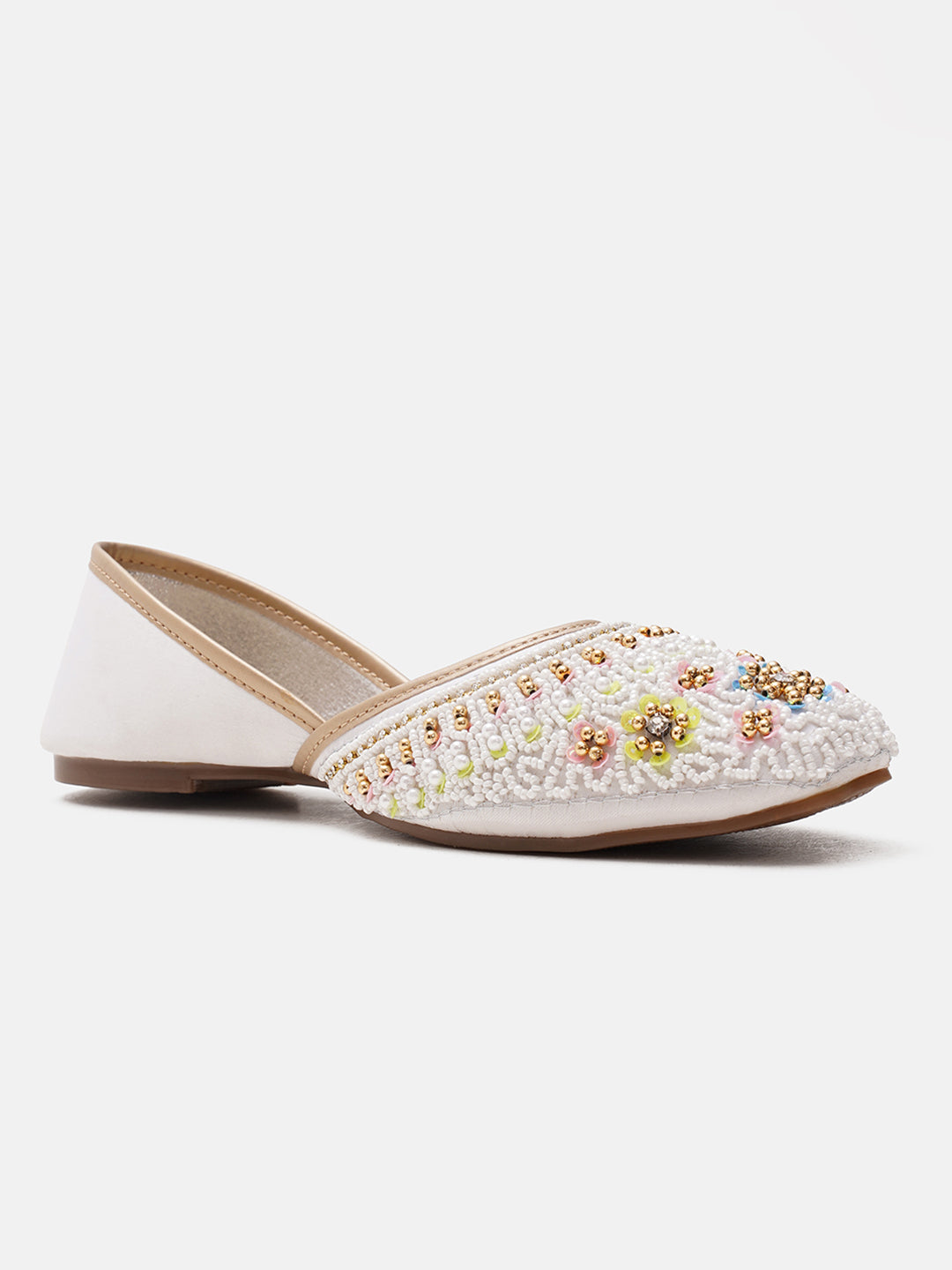 traditional juttis with intricate floral embroidery and detailed beadwork on the upper
White