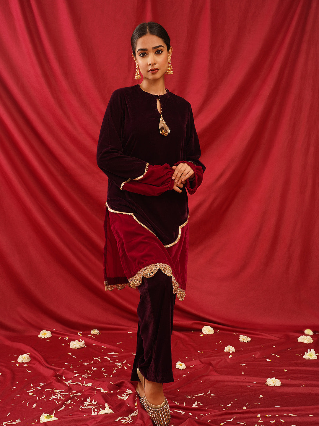traditional juttis with intricate striped beadwork covering the entire upper
White