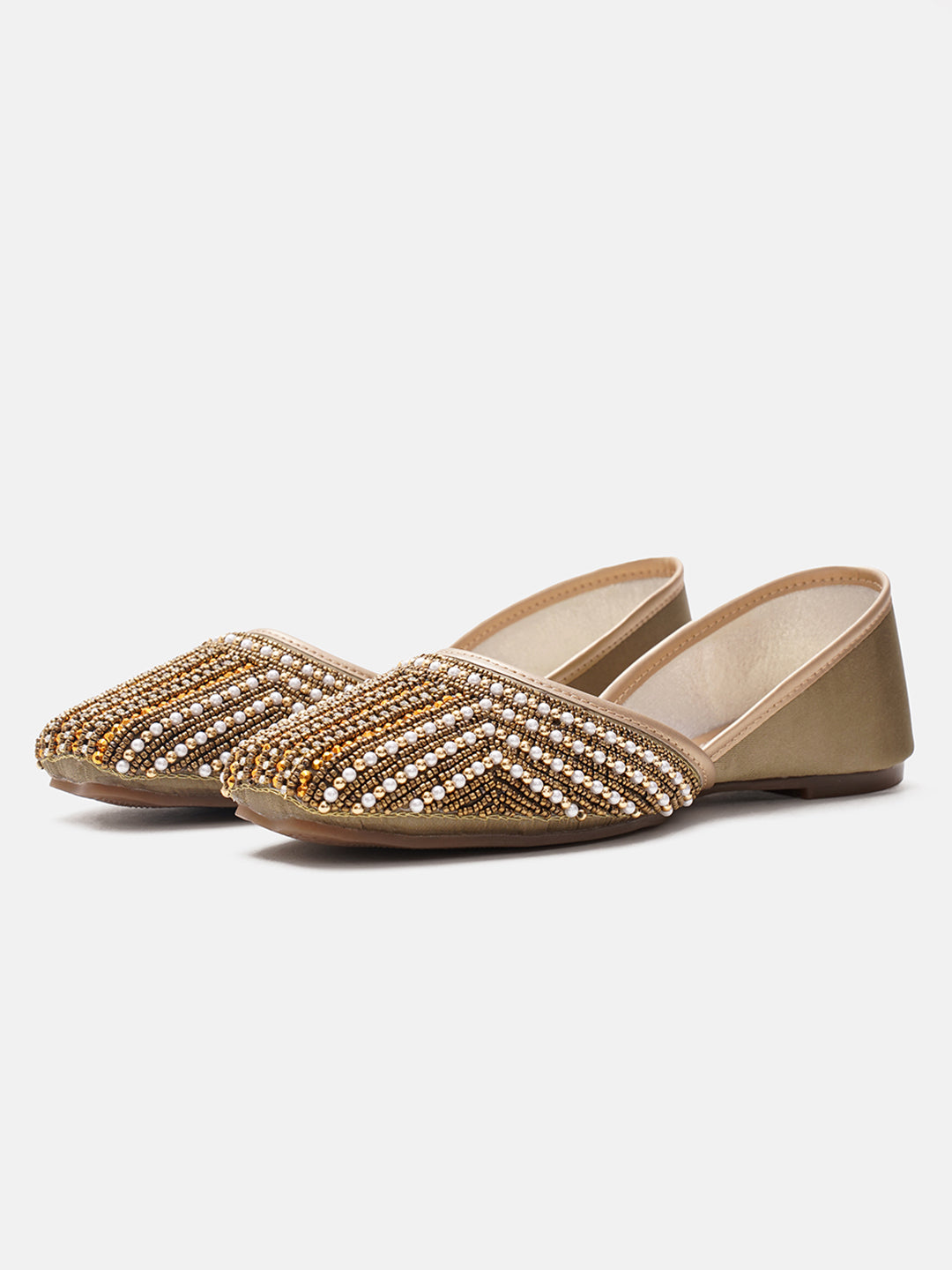 traditional juttis with intricate striped beadwork covering the entire upper
White