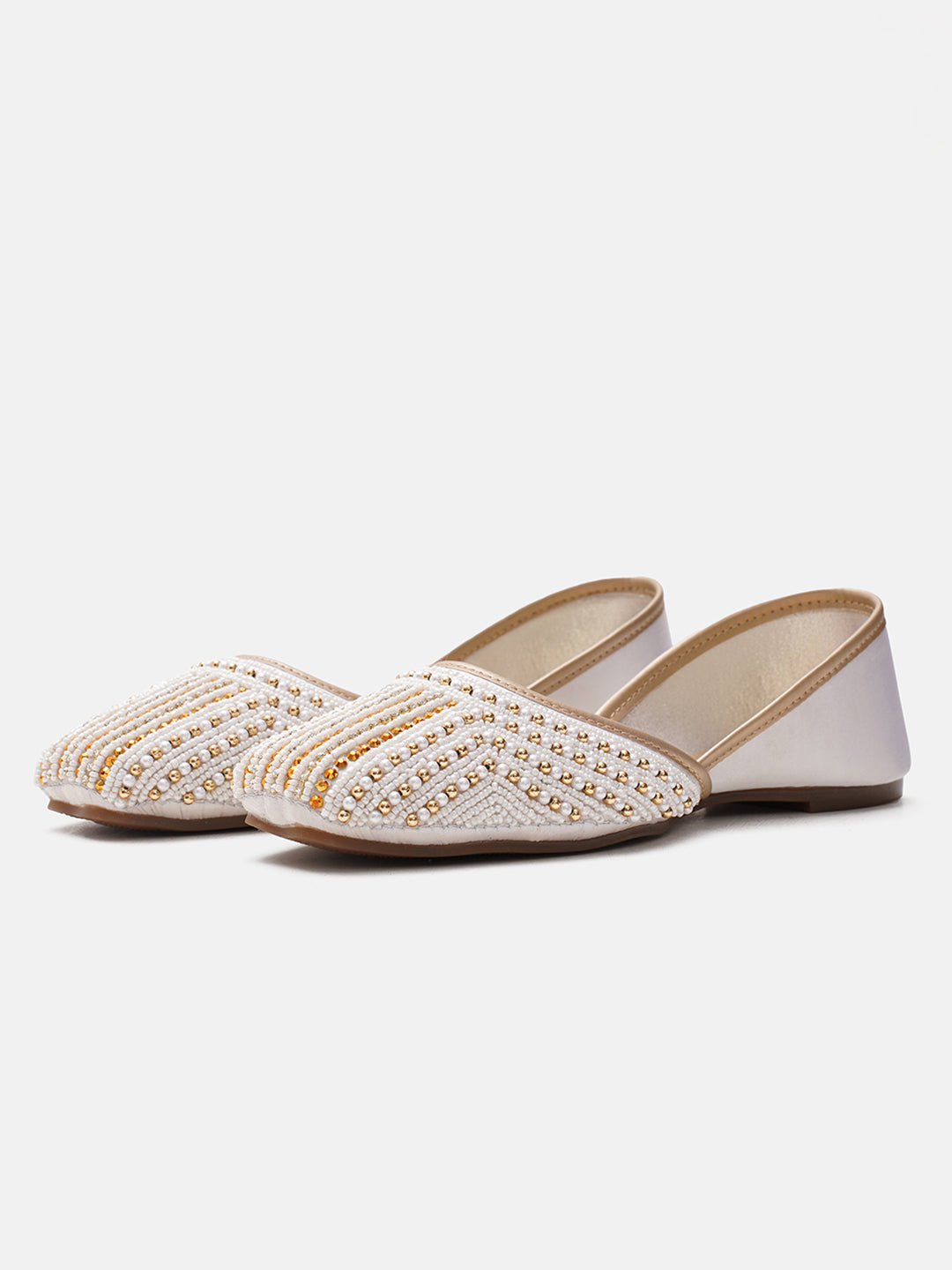 traditional juttis with intricate striped beadwork covering the entire upper
Green