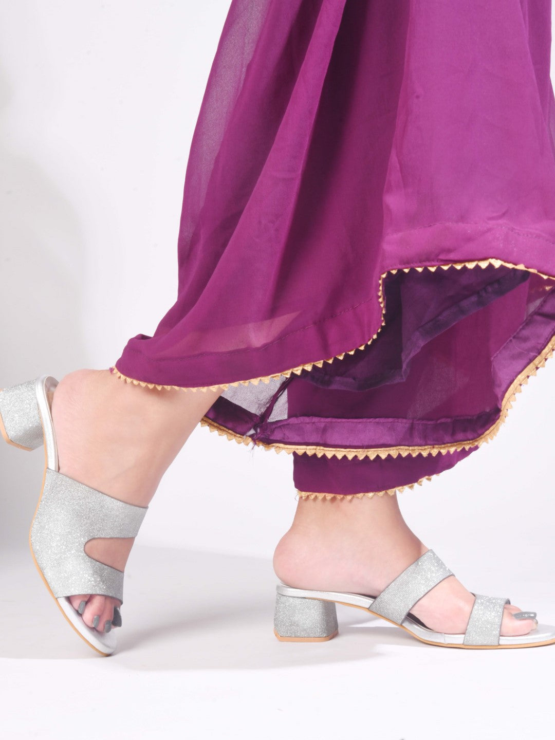 Jm Looks wedge slides featuring a decorative bow and a small charm
Silver