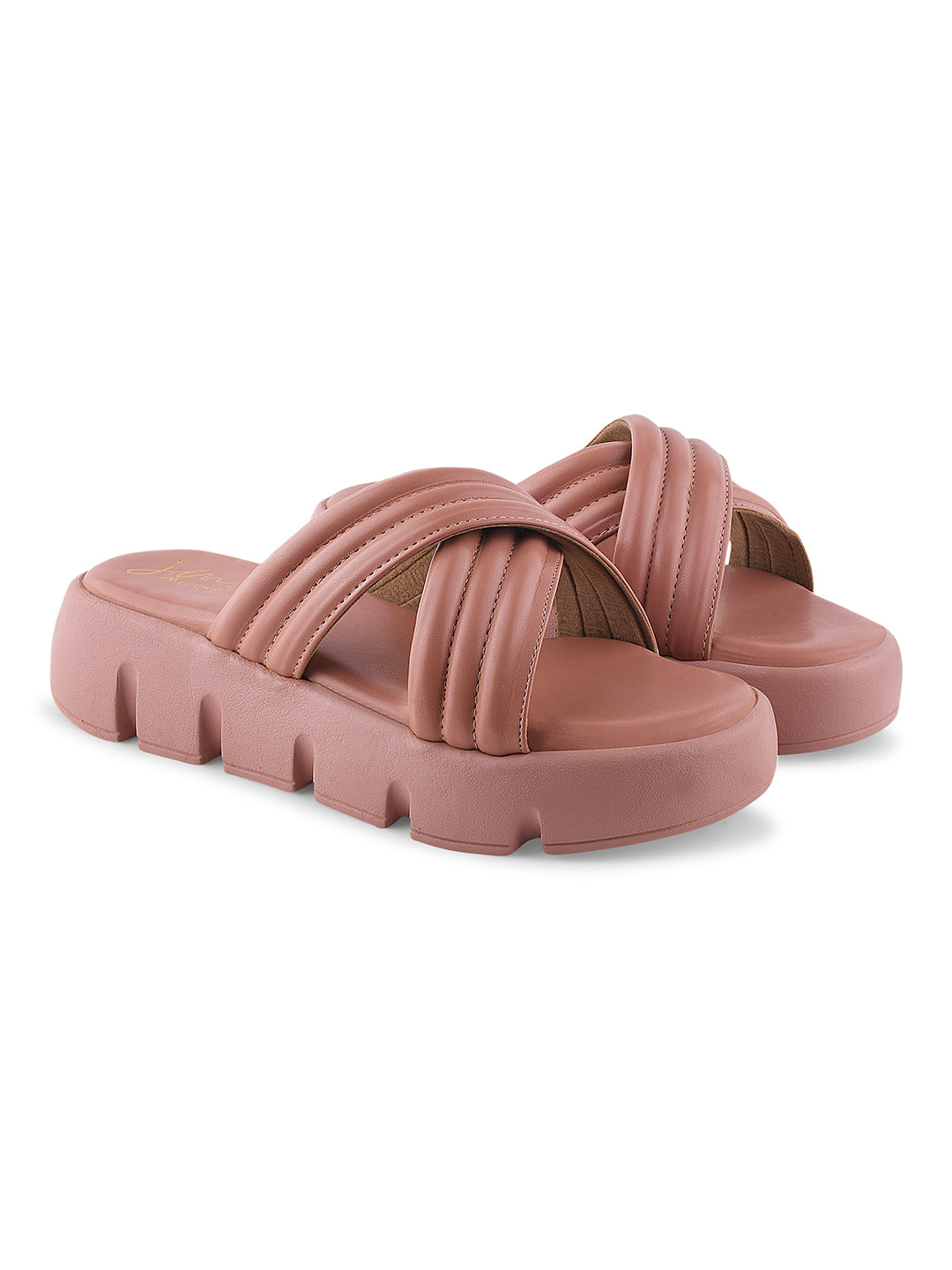 women's platform slides with wide, padded crisscross straps and a chunky lug sole
Peach