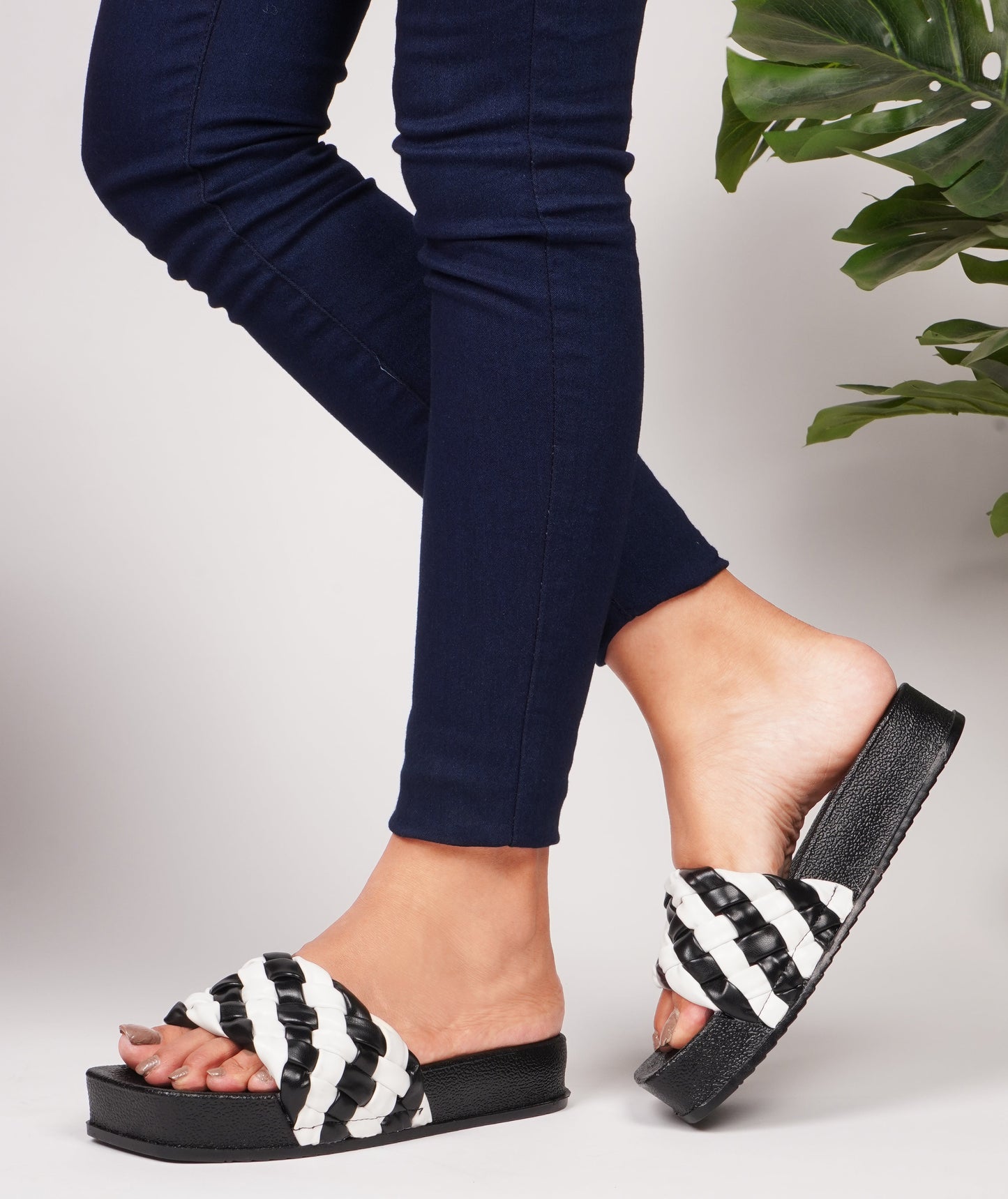 Jm Looks platform slides with a distinctive braided strap
Black