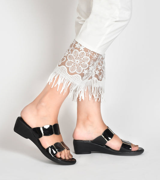 wedge heel slides featuring unique scalloped straps
 Black