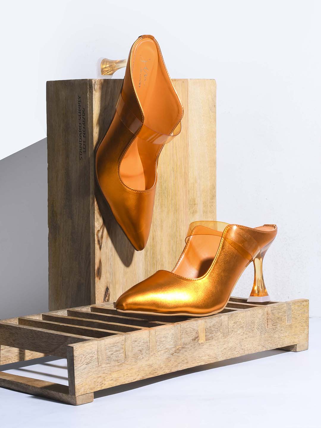 Jm Looks women's pointed toe mule heels with an ankle strap
Orange
