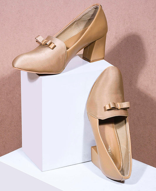 Jm Looks block heel pumps featuring a small decorative bow on the vamp
 Beige