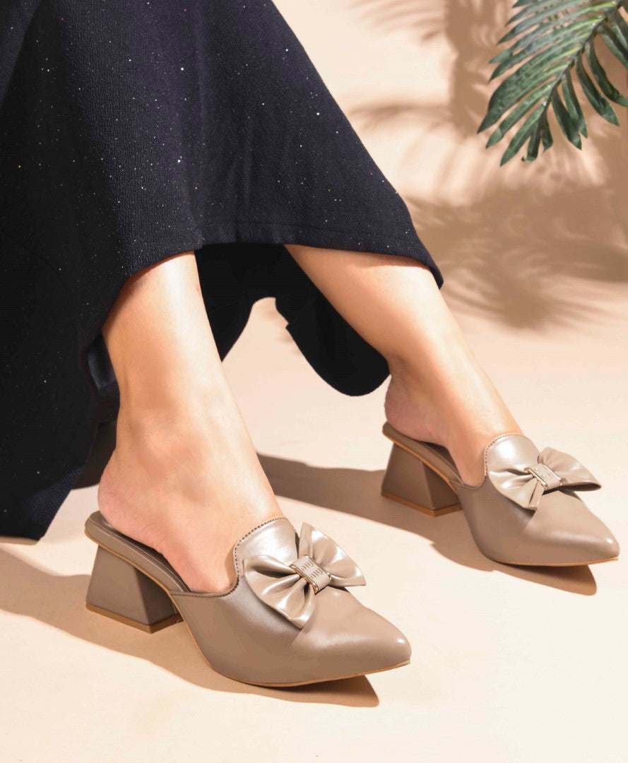 JM Looks women's pointed-toe mules with a decorative bow and a block heel
Beige