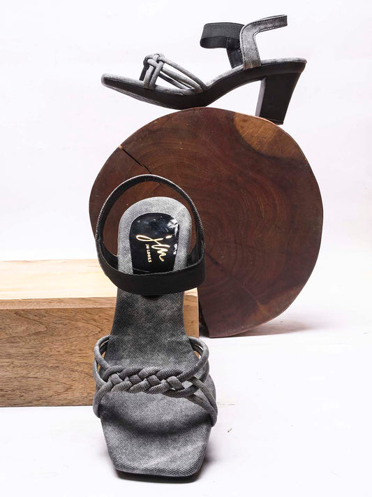 women's block heel sandals with intricate knotted and braided strap details
 Black