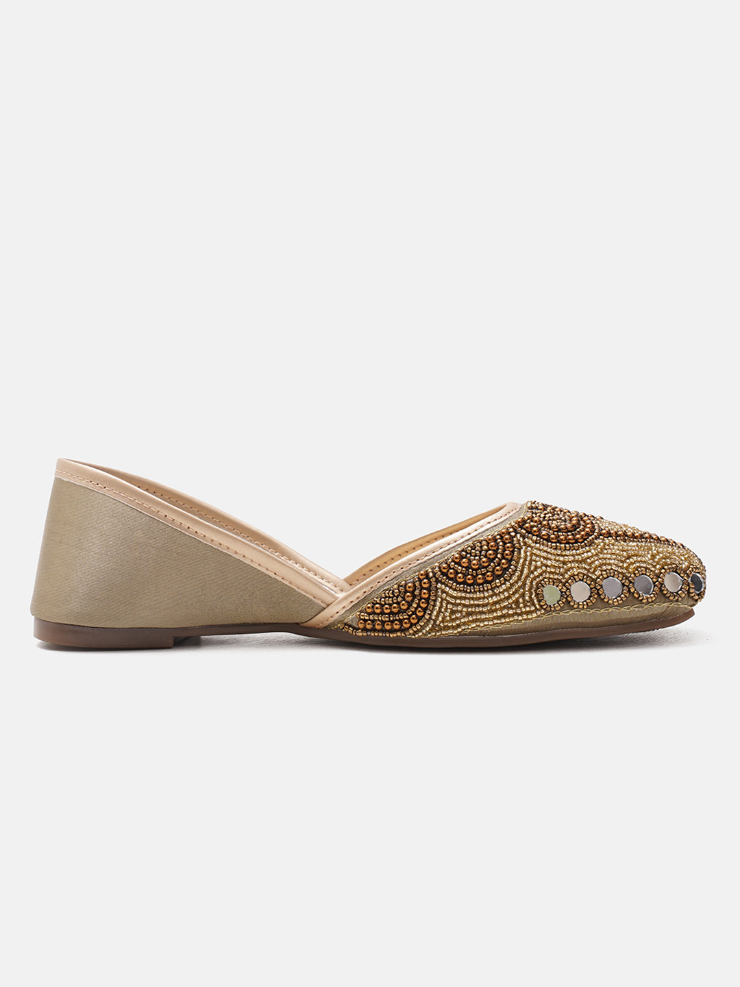 traditional juttis heavily embellished with pearls and beads on the upper
White
