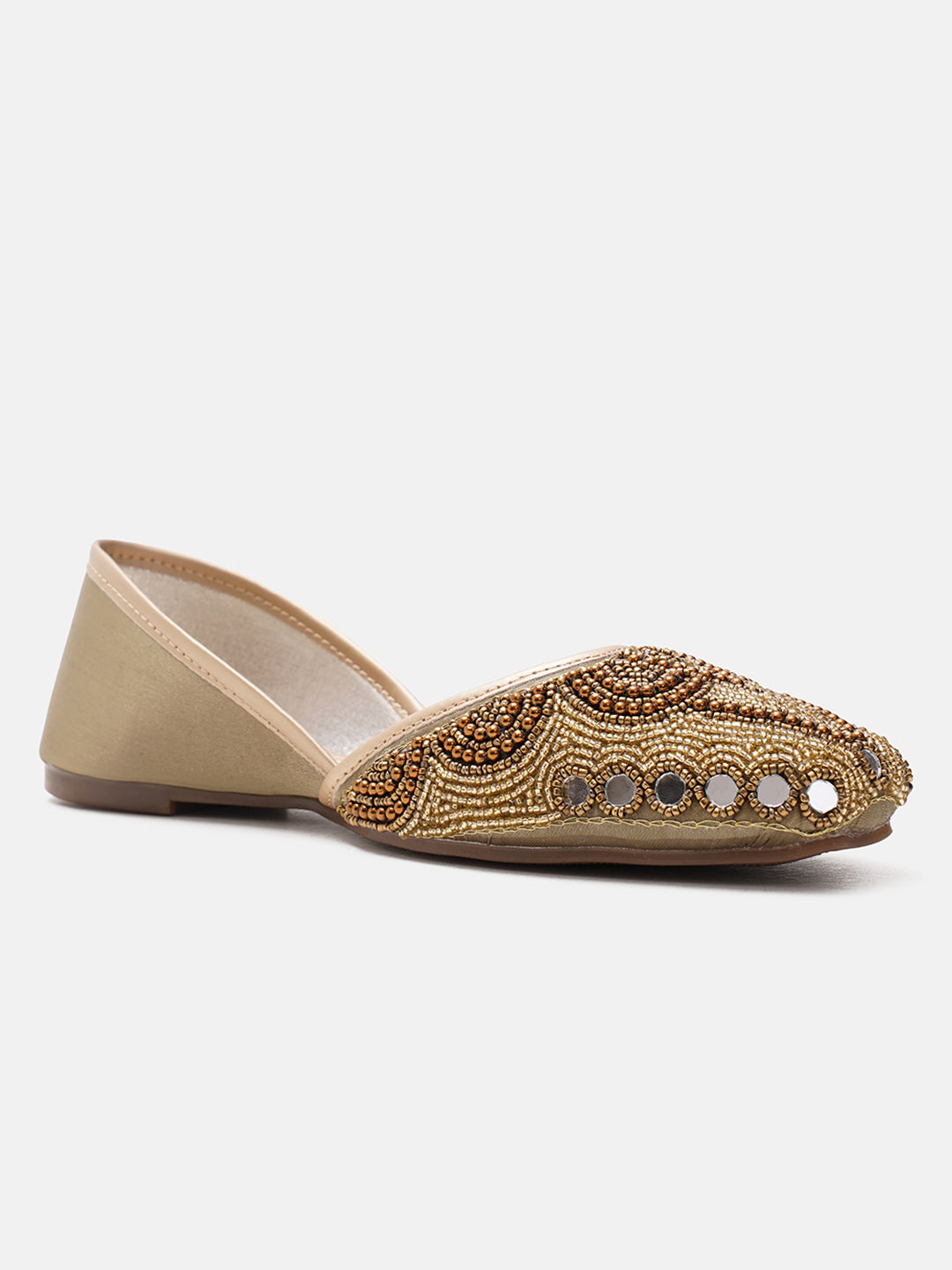 traditional juttis heavily embellished with pearls and beads on the upper
White