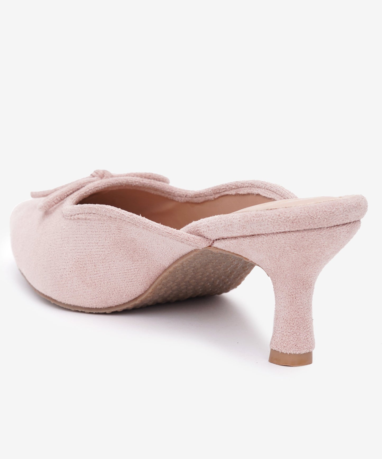 Peach suede pointed-toe kitten heel mules with bow detail, slip-on backless design, comfortable everyday wear.