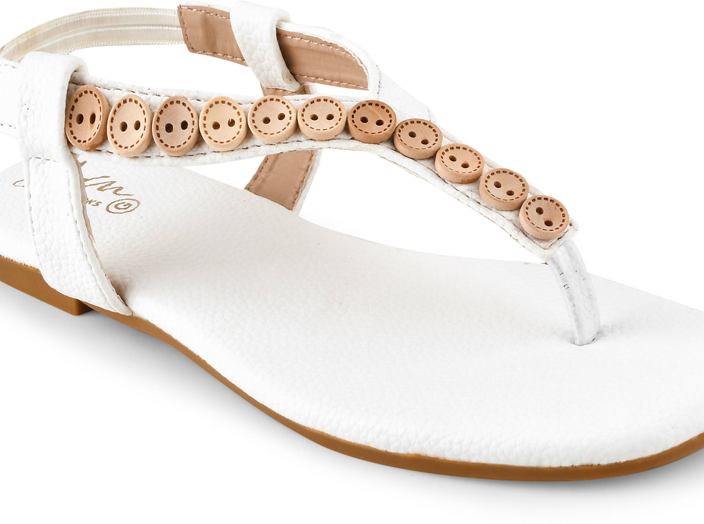 White flat thong sandals with button embellishments and slingback strap for women