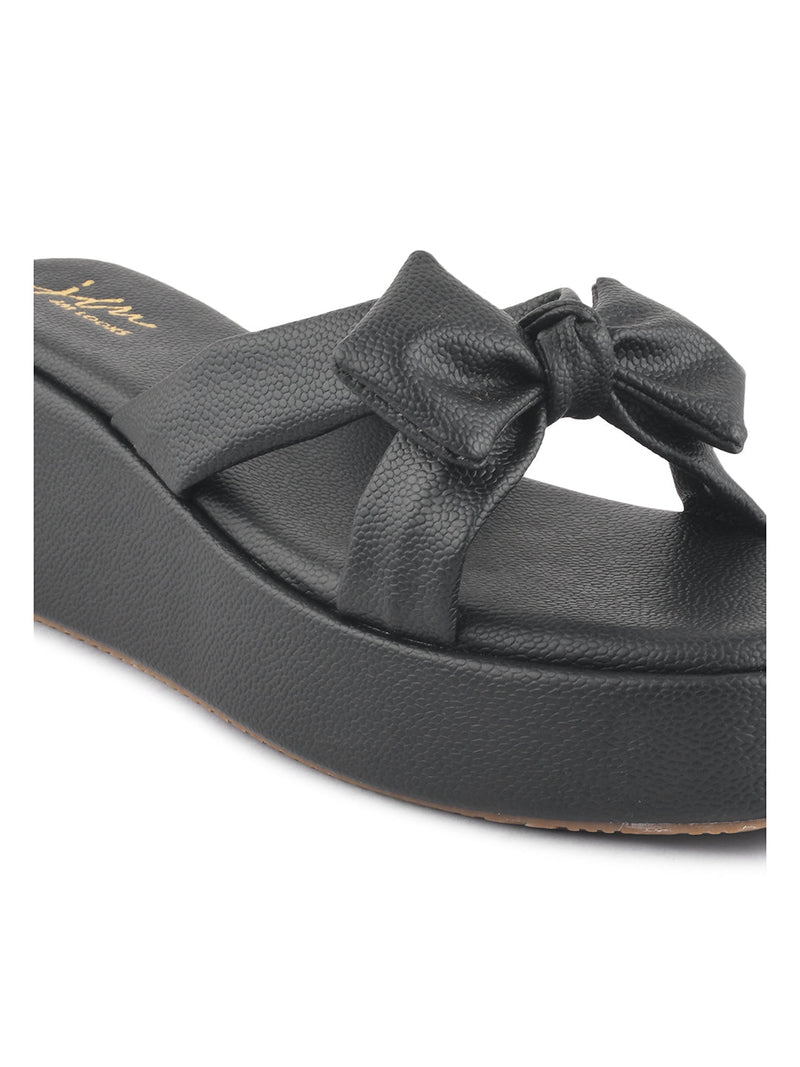 Jm Looks platform slides featuring a large, knotted bow on the strap
 Black