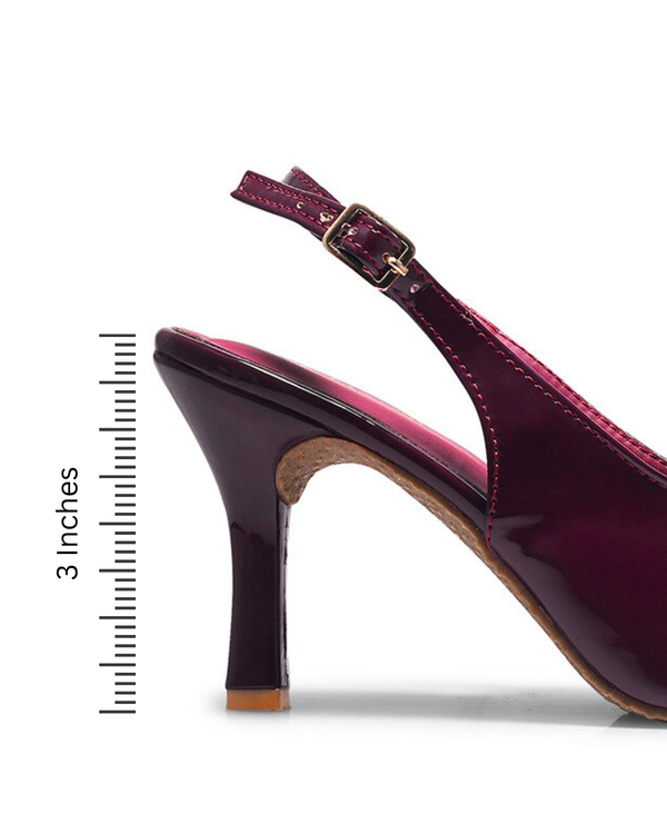 Cherry patent slingback heels with pointed toe, decorative bow detail, glossy finish, elegant stiletto silhouette.