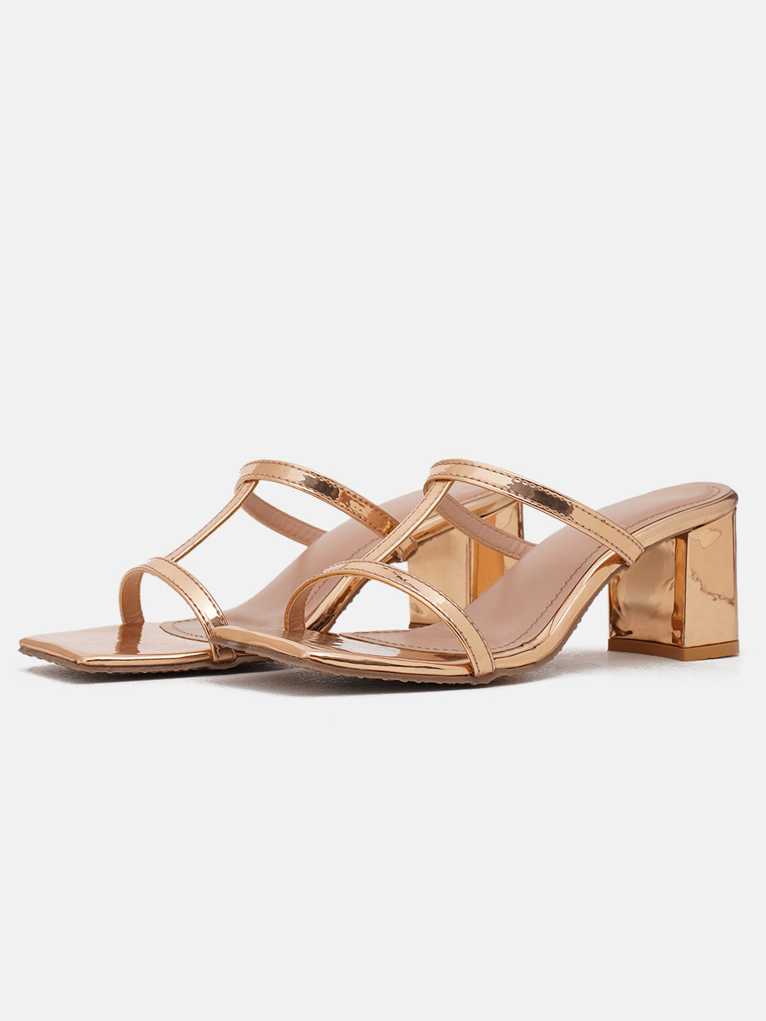 strappy block heel mules with a square toe design
 Sultan