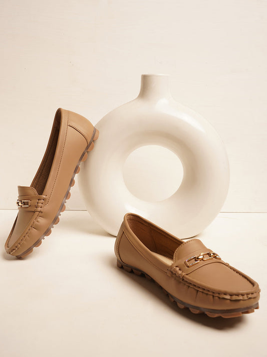 casual loafers with a metal bit embellishment on the vamp and a textured sole
 Beige