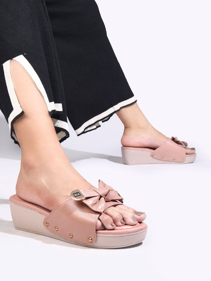 JM Looks women's platform wedges with a bow detail on the strap
 Peach