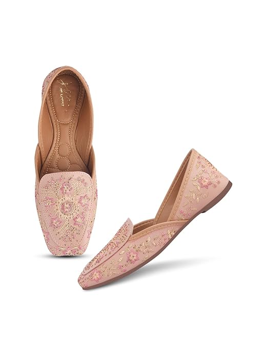Peach embroidered juttis with intricate threadwork — women's traditional mojari flats