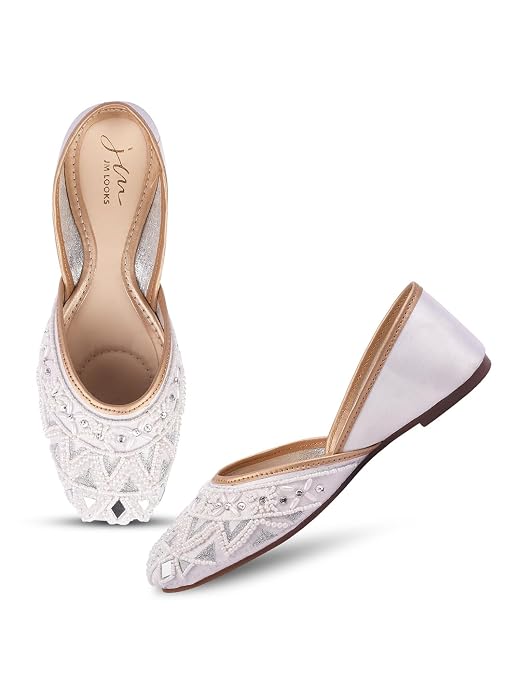 Women white rounded toe embellished traditional juttis with geometric patterns and beadwork 