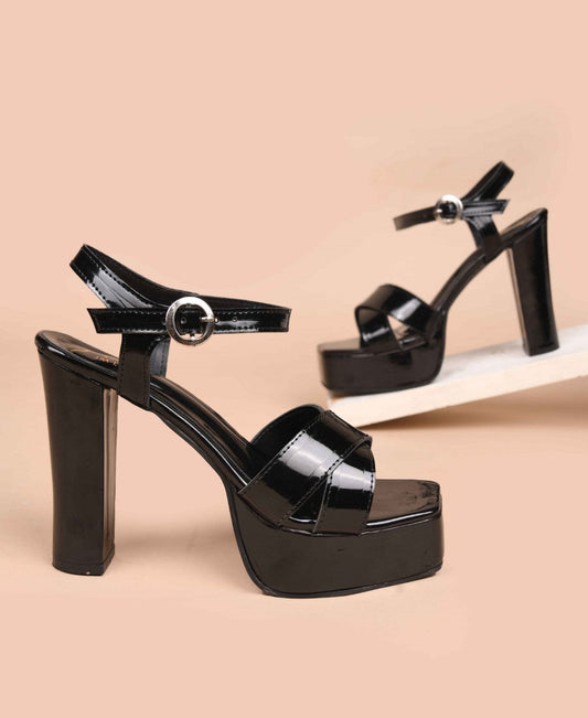 open-toe platform block heels with a glossy patent finish, crossover straps, and an ankle strap
 Black