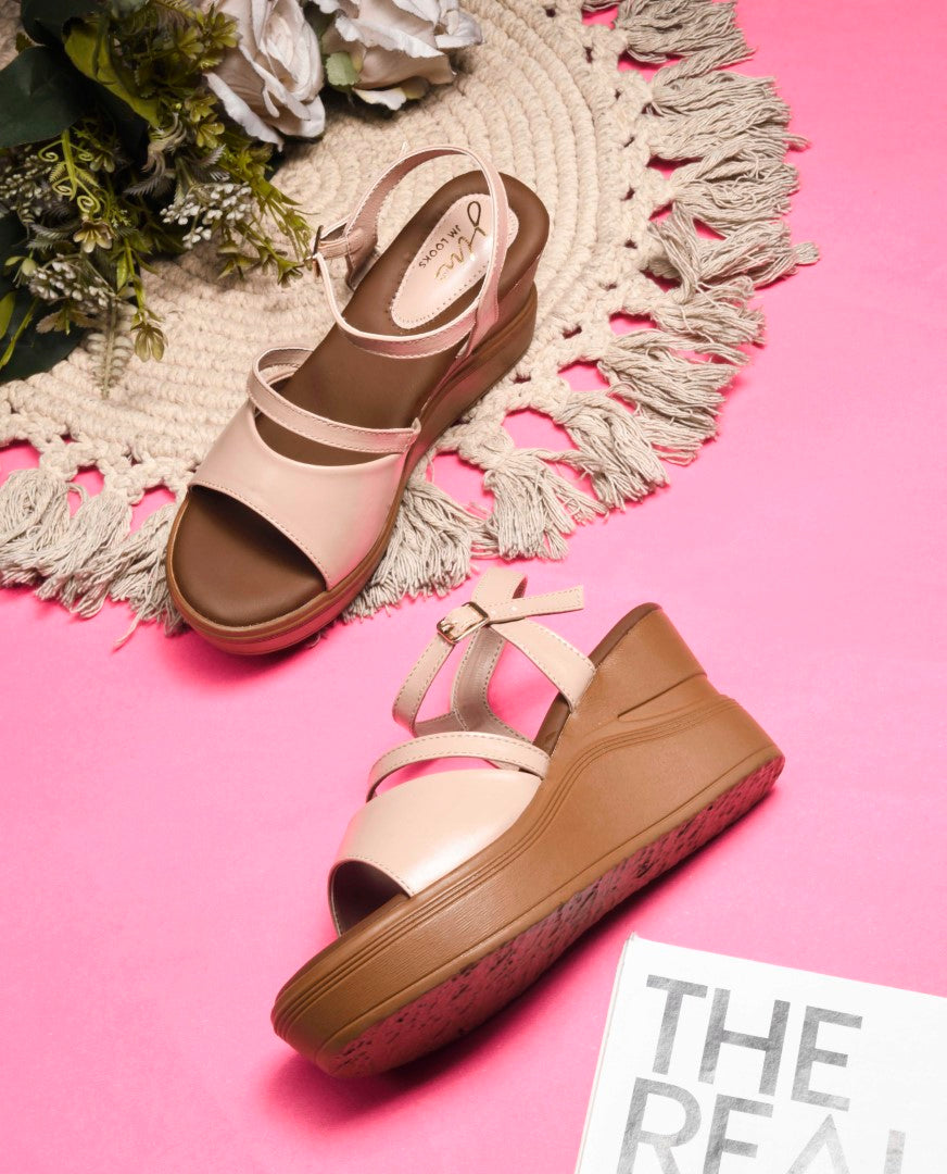 open-toe wedge sandals with a wide forefoot strap and an adjustable ankle strap
 Cream