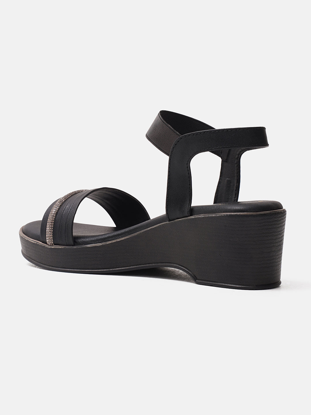 platform sandals with an embellished forefoot strap and an adjustable ankle strap
 Black
