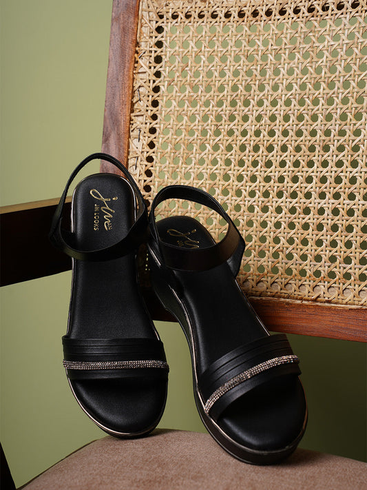 platform sandals with an embellished forefoot strap and an adjustable ankle strap
 Black