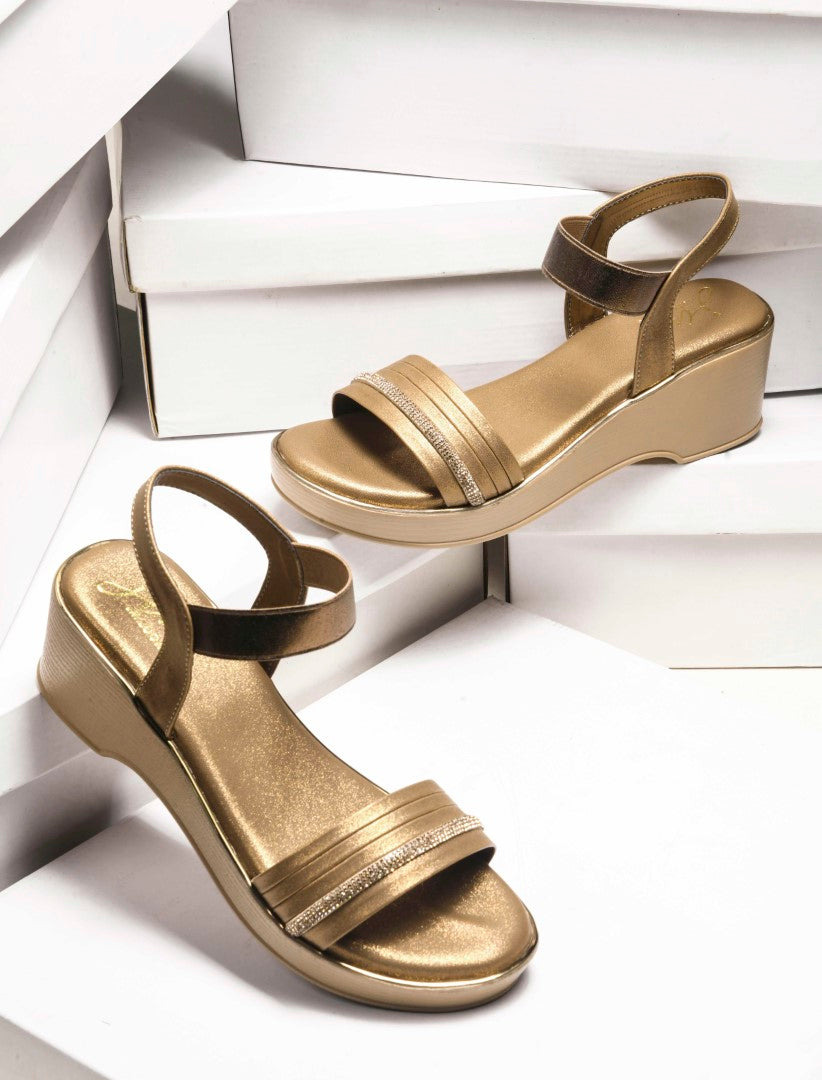 platform sandals with an embellished forefoot strap and an adjustable ankle strap
 Beige