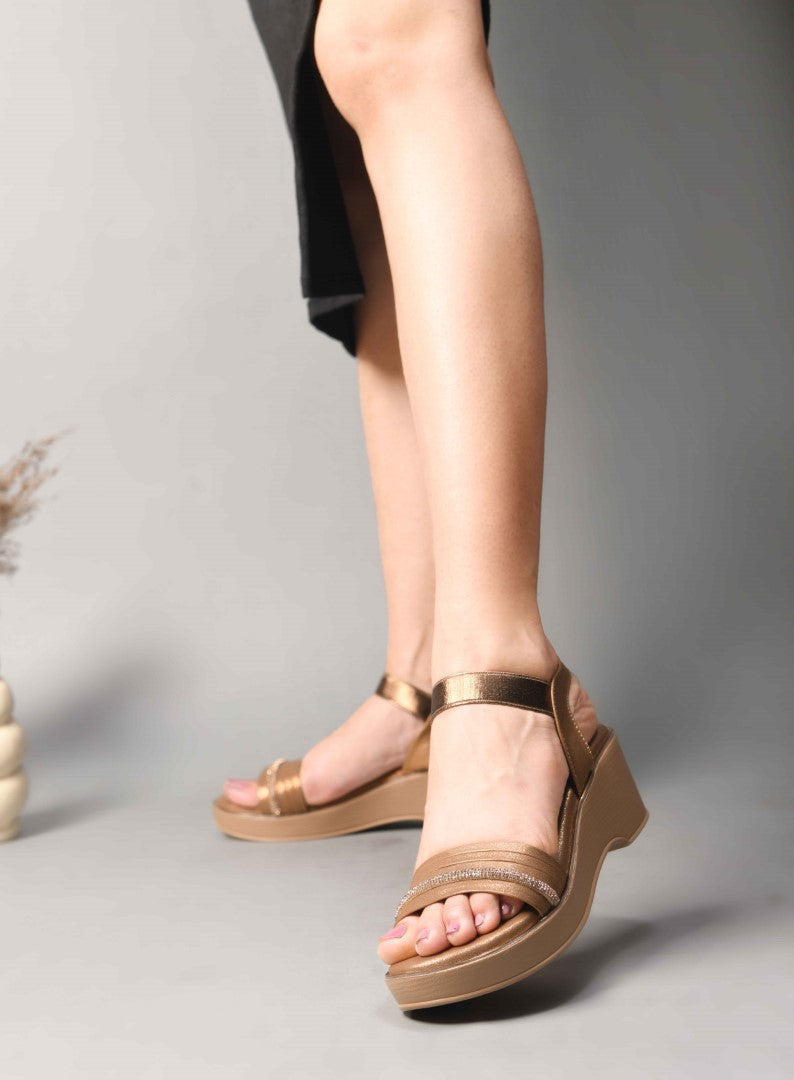 platform sandals with an embellished forefoot strap and an adjustable ankle strap
 Beige