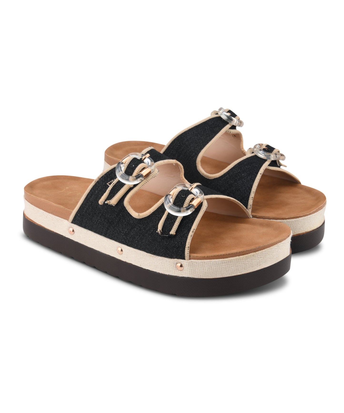 Black denim platform slides for women with dual straps, clear buckles, cushioned tan footbed and chunky sole