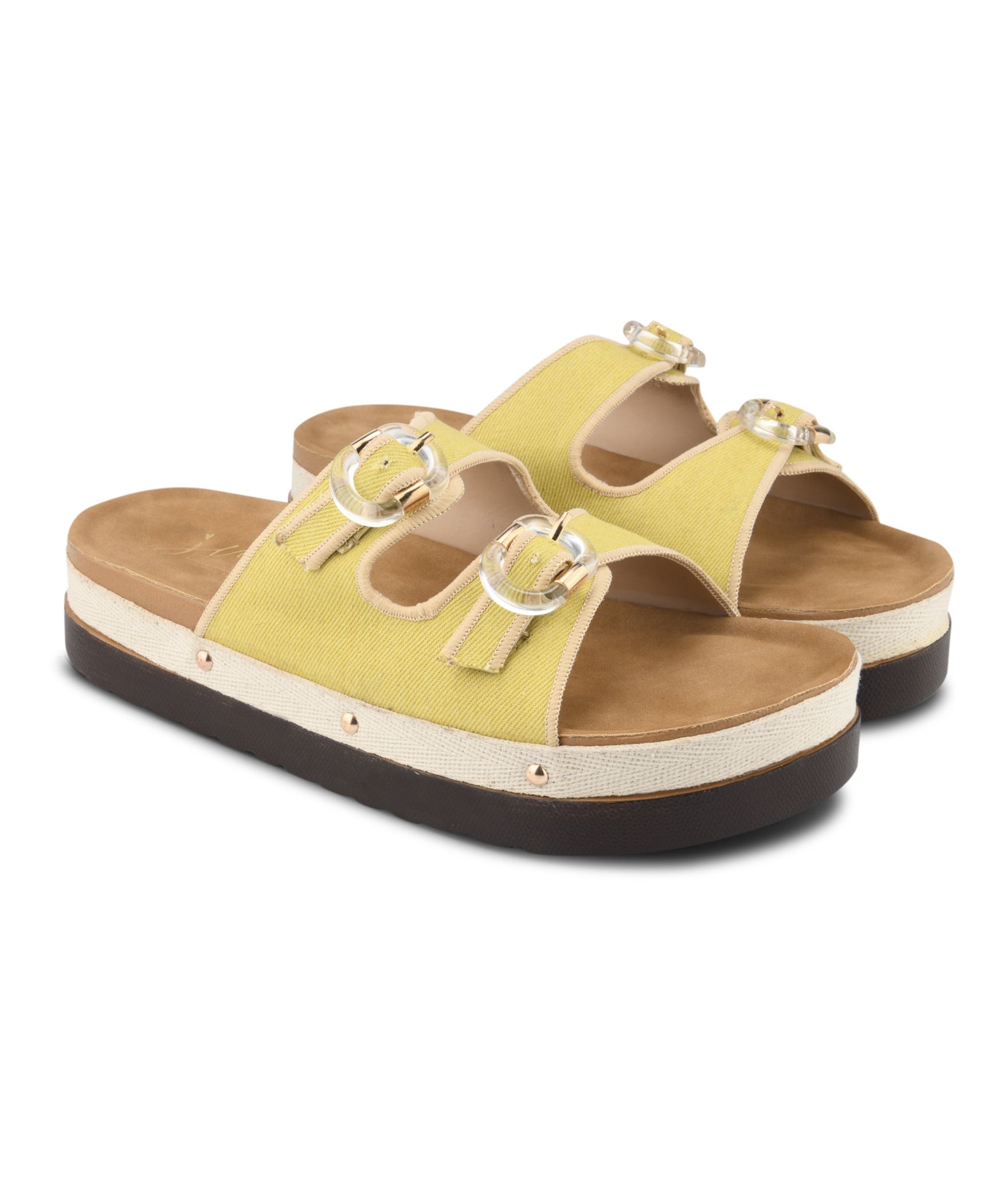 Yellow denim platform slides for women with dual straps, clear buckles, cushioned tan footbed and chunky sole
