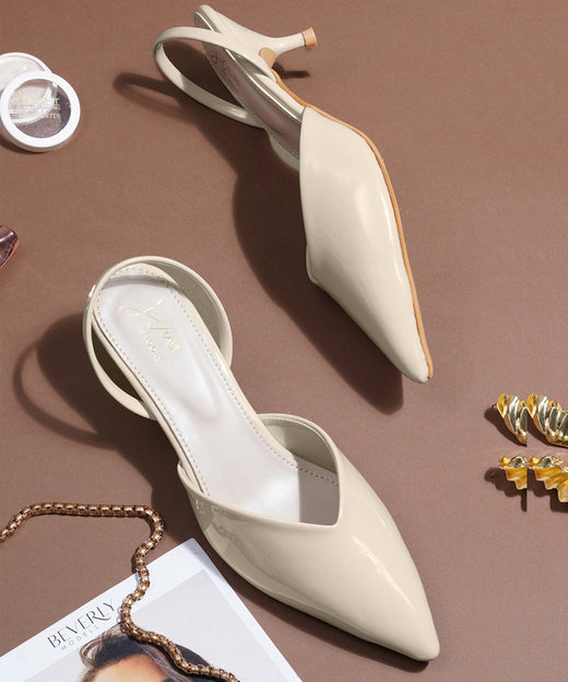 Slingback kitten heels for women in beige patent finish with pointed toe and slim heel