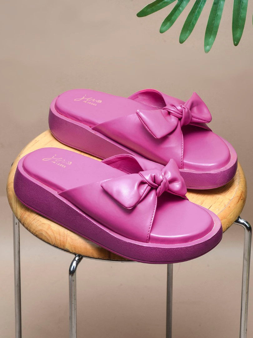 JM Looks women's platform slides with a large bow detail on the strap
 Pink