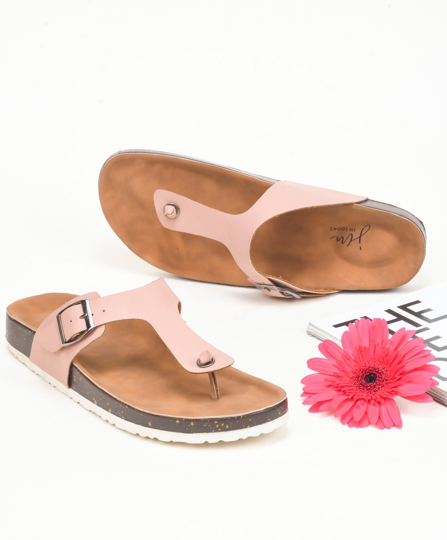 women's thong sandals with an adjustable buckle strap and a contoured footbed
 Nude