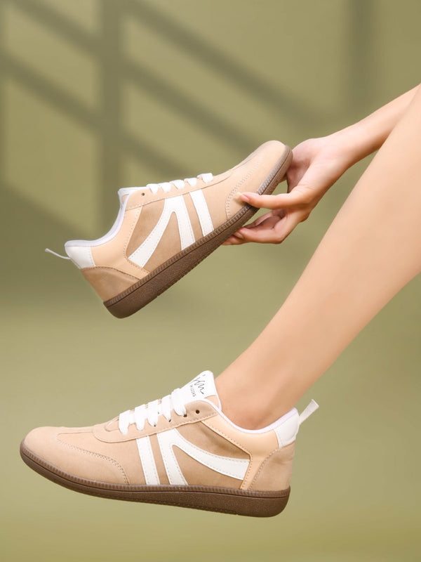 Beige casual sneakers for women featuring white side stripes retro low-top design and brown gum sole