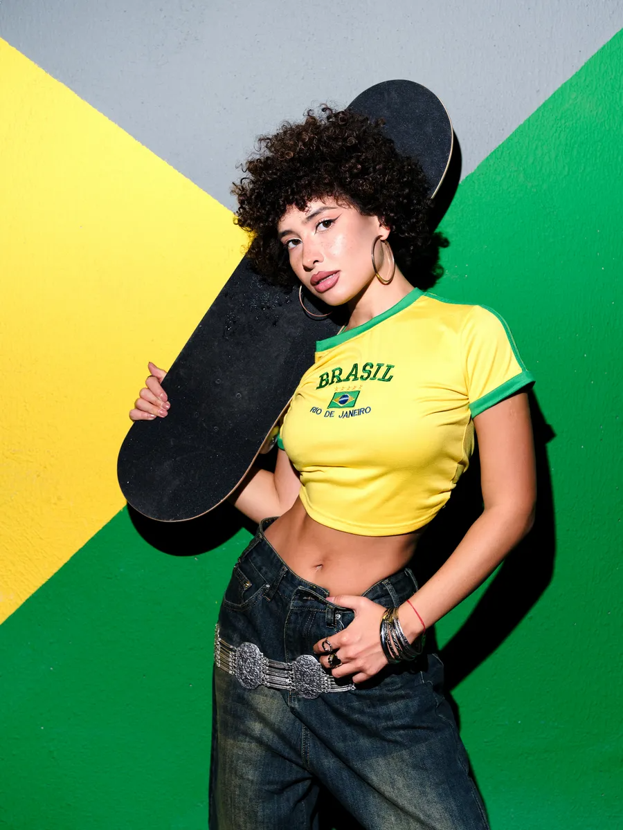 Yellow-Green brazil crop top for women featuring contrast trim, graphic print, fitted short sleeves, casual sporty aesthetic.