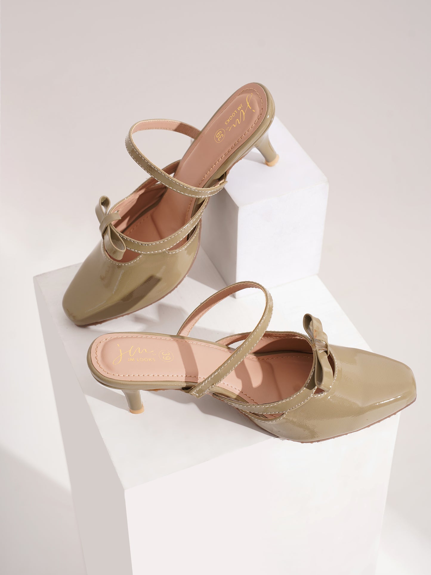 bow-detail kitten heel mules with double straps and a pointed toe
 Green
