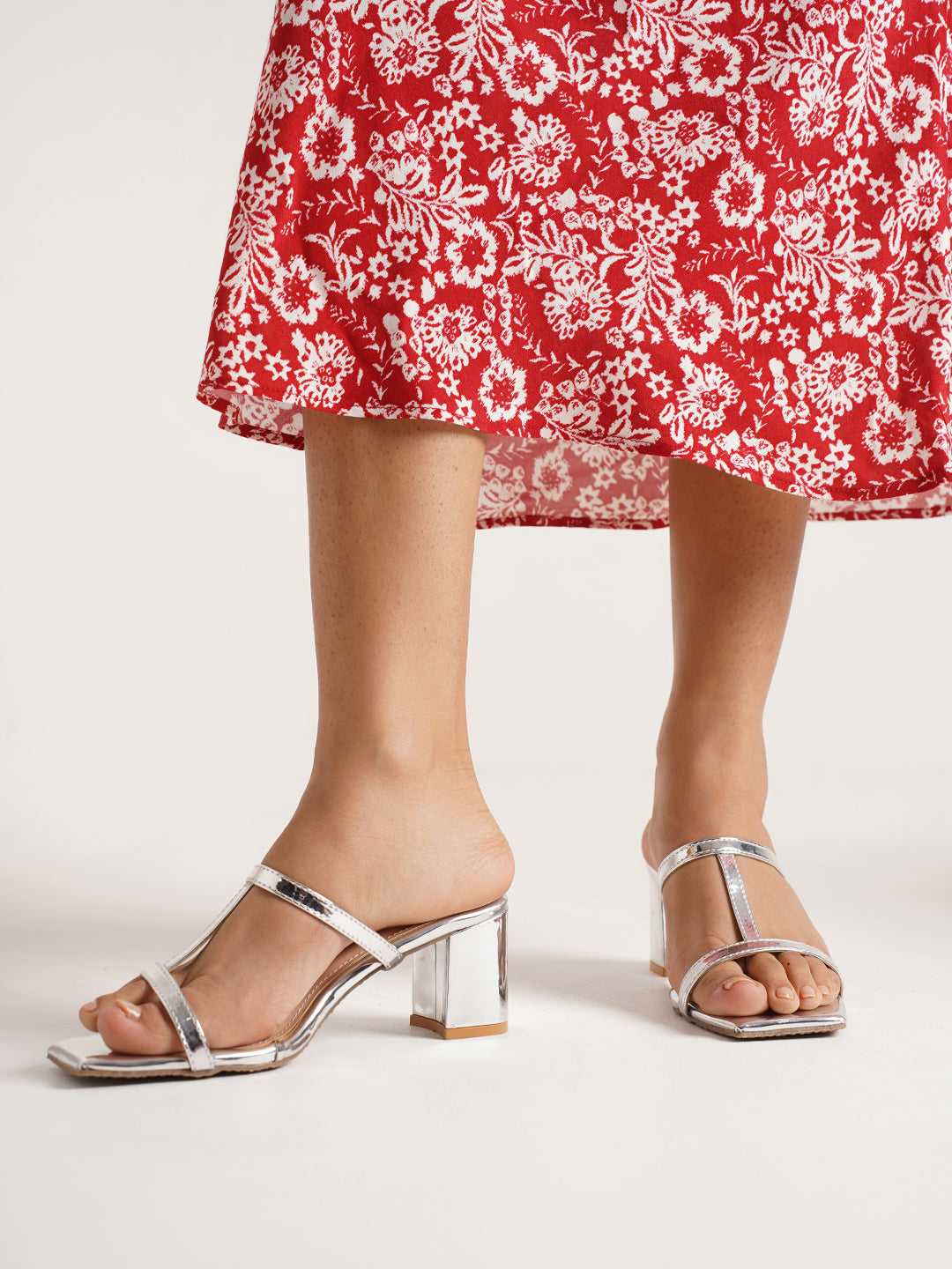 strappy block heel mules with a square toe design
 Silver