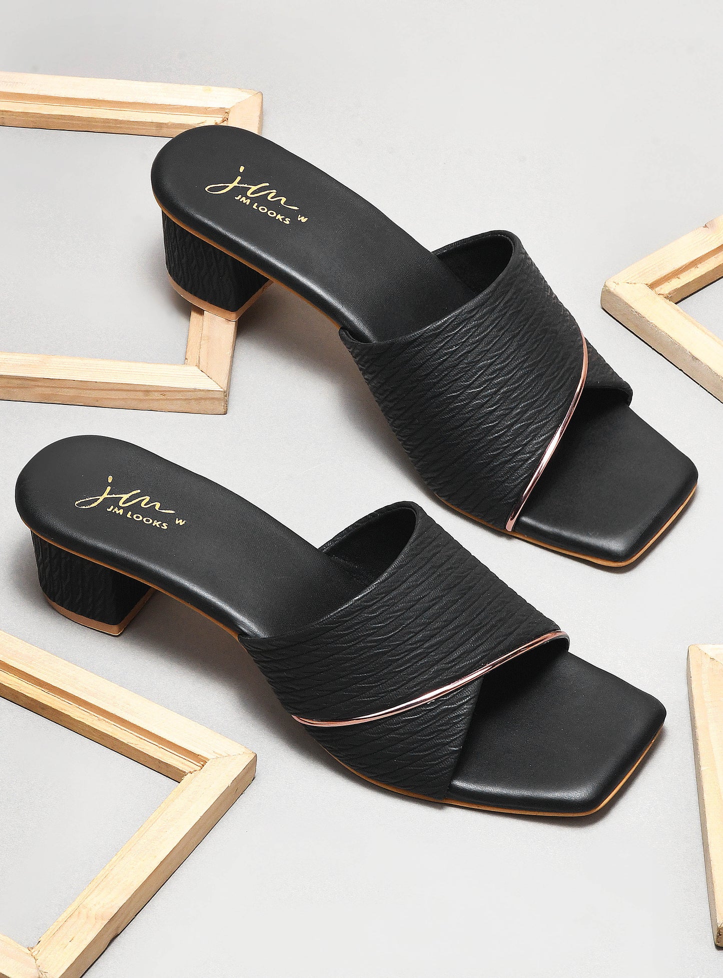 women's block heel slides with a textured wide strap and a subtle accent trim
 Black
