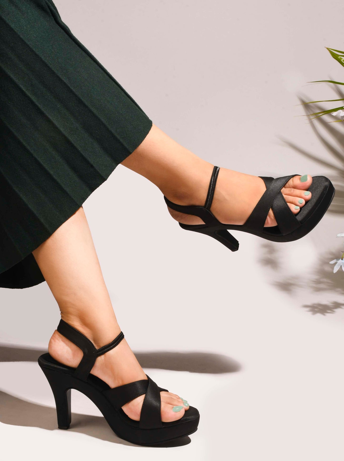 Jm Looks women's crisscross platform heels with a sleek finish
 Black
