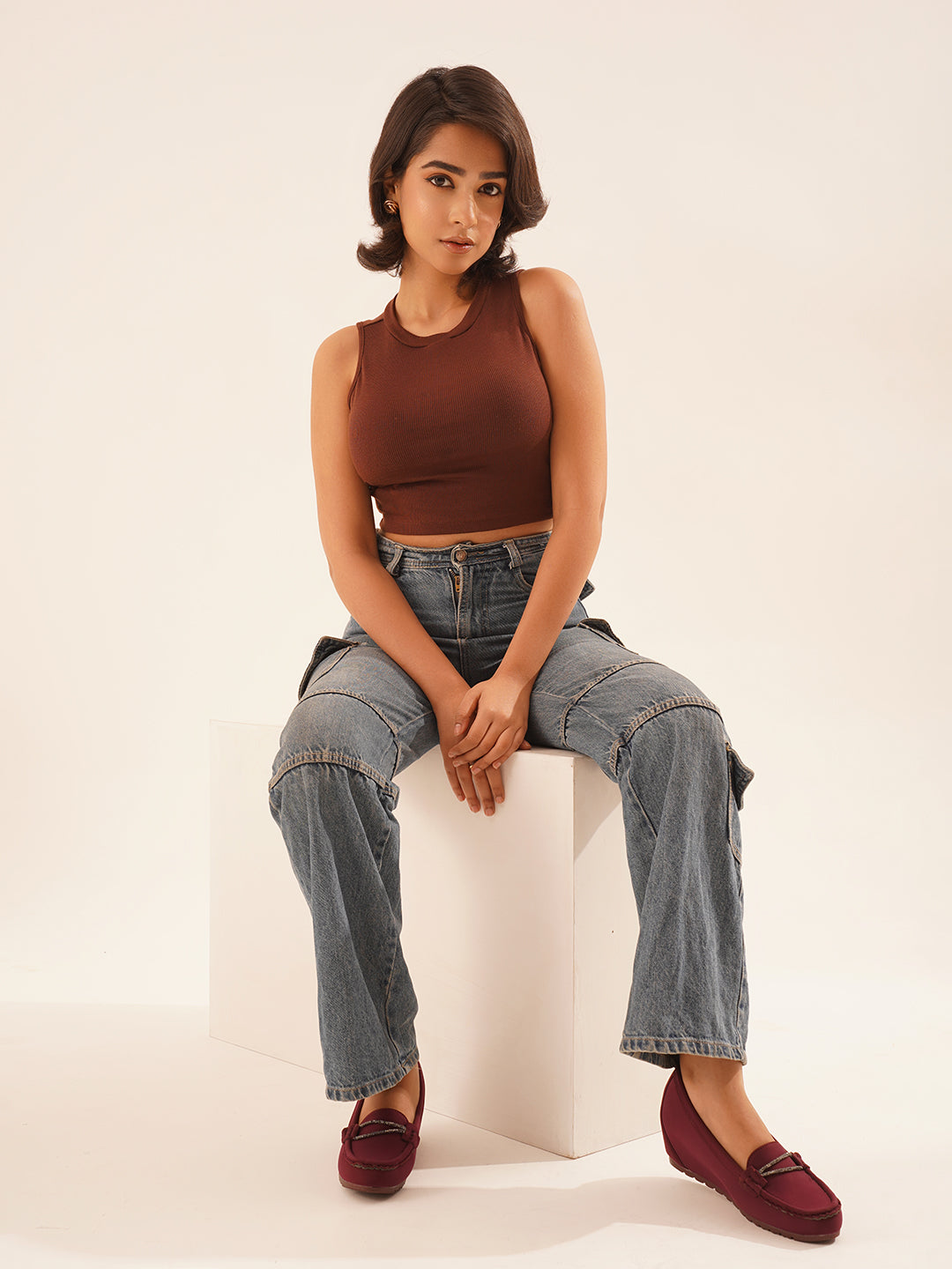 loafers with a subtle wedge heel and an embellished buckle detail on the vamp
 Cherry
